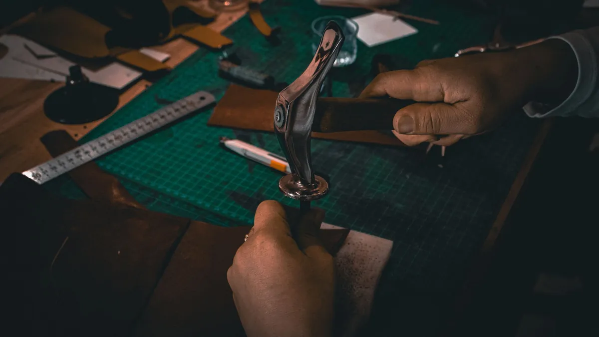Punch tool creating even holes along a leather edge